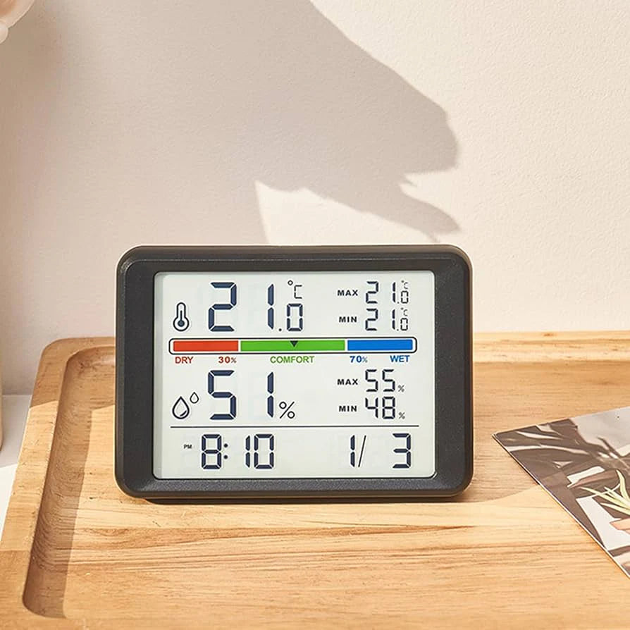 ساعة رقمية متعددة الوظائف مع شاشة LCD لعرض الوقت ودرجة الحرارة والرطوبة